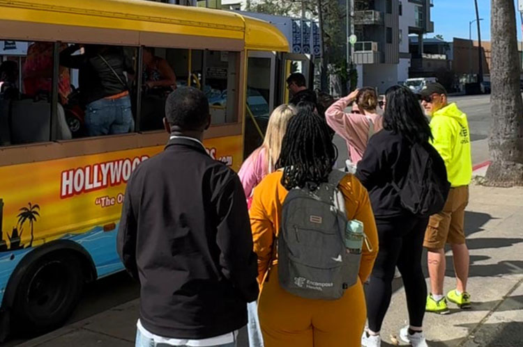 Customers boarding Hollywood Tour Bus